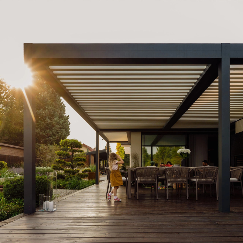 Pergola over outdoor kitchen on decking