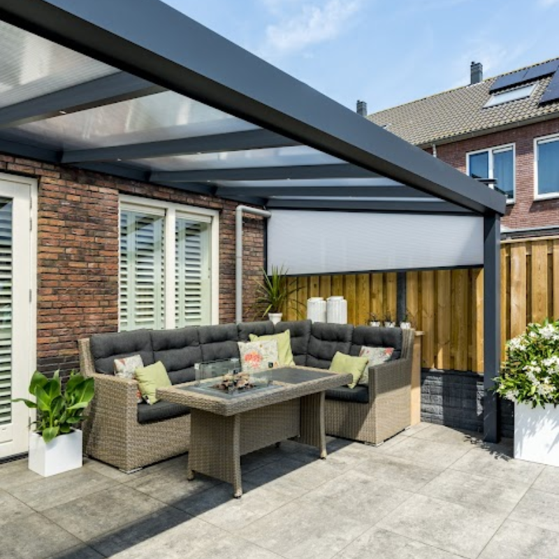 Deponti Giallo Aluminium Veranda with sofa underneath