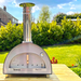 Front view of Igneus Pro 600 with door closed lifestyle shot in garden
