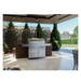 Lifestyle shot of Whistler Bibury 5 + Side burner Gas BBQ in large garden setting