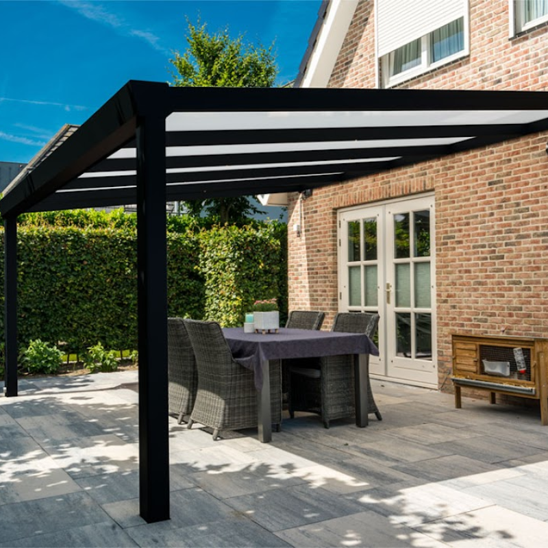 Side view of Deponti Giallo Aluminium Veranda next to house