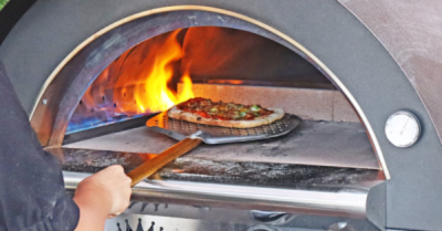 Lifestyle shot of Clementi Original gas fired pizza oven