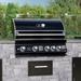 Front view of black Whistler Burford 4 Burner Barbecue with Rotisserie and Weather Cover in garden
