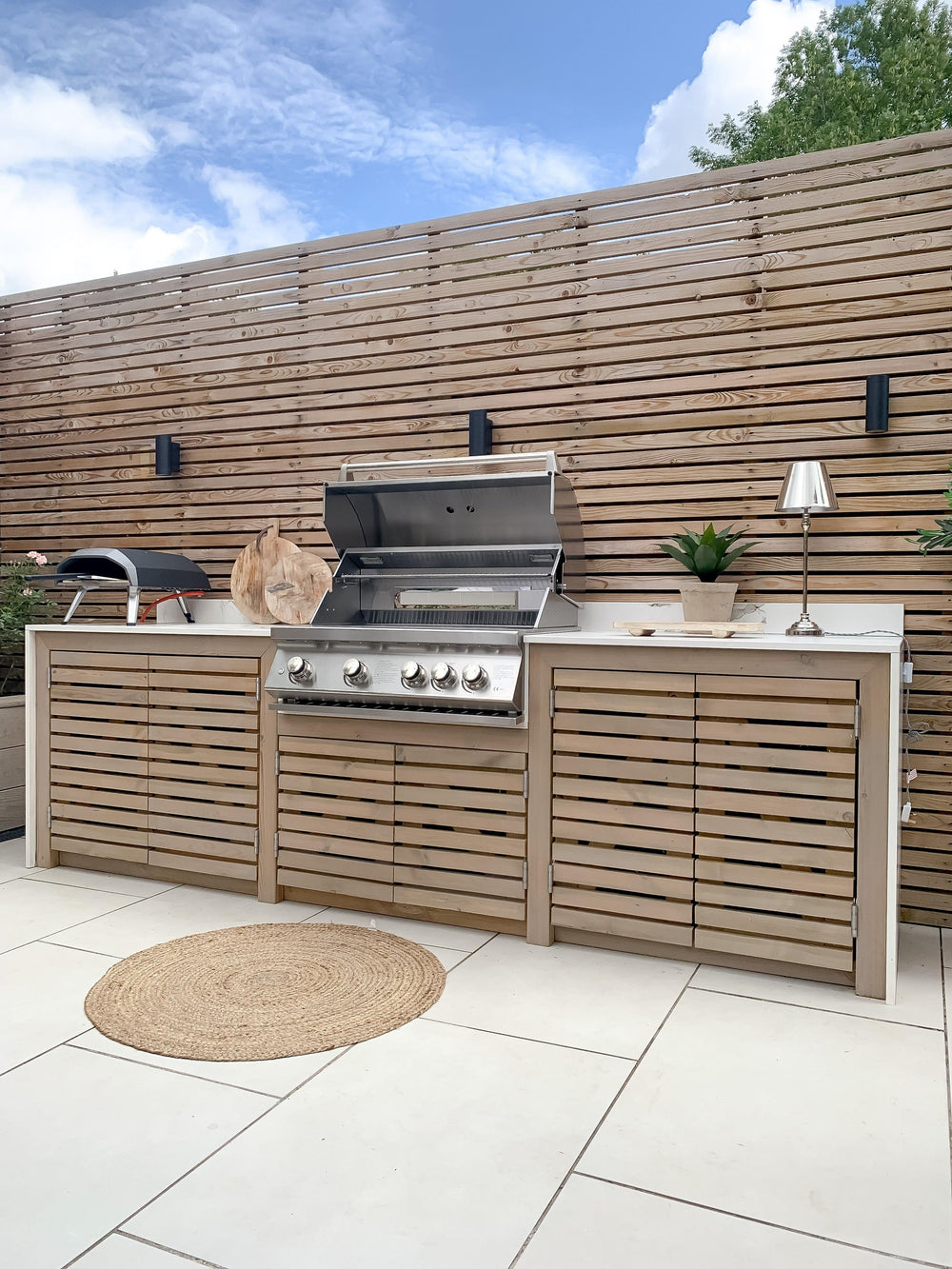 lifestyle view of Burford grill in the garden